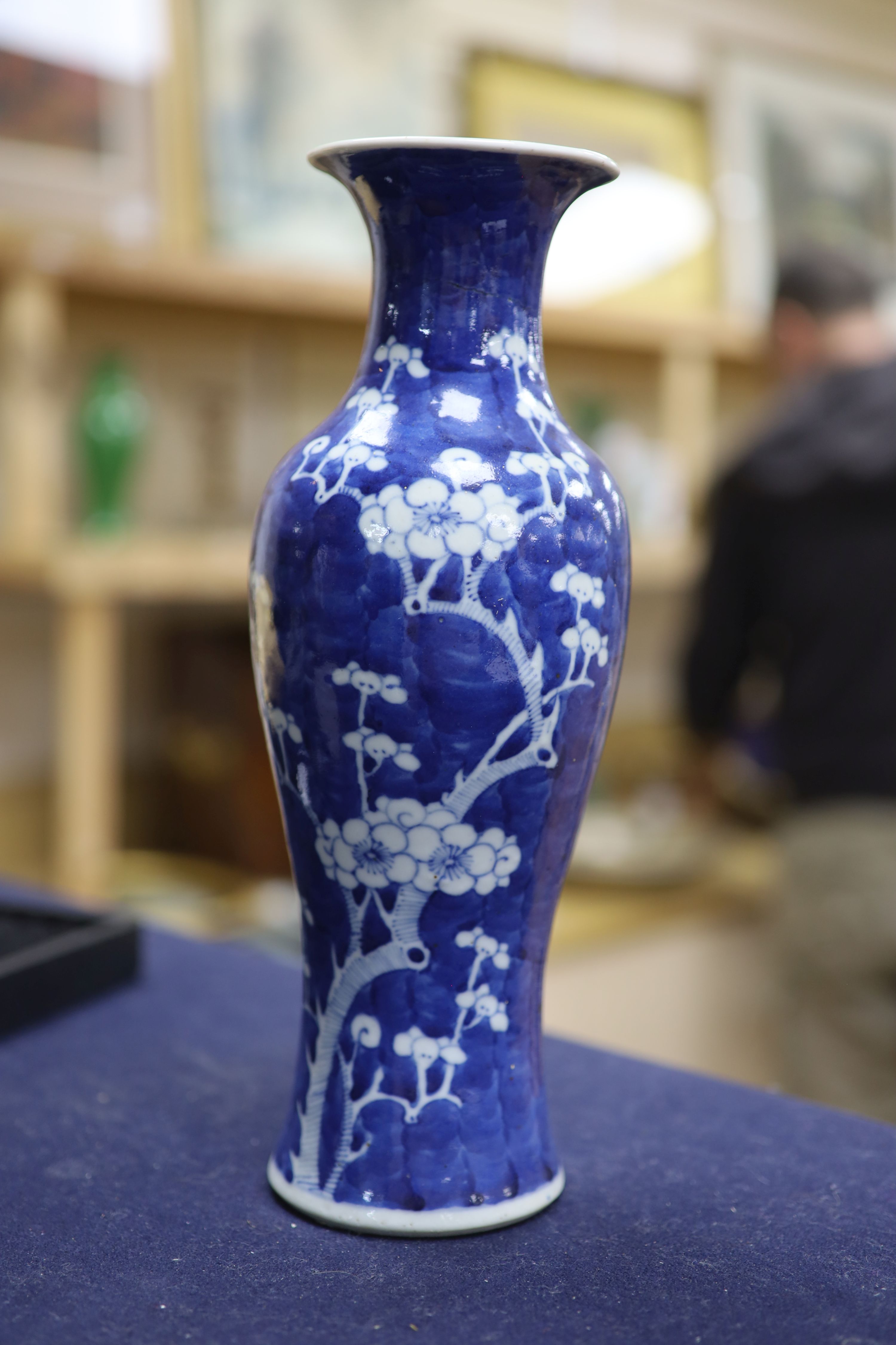 A pair of slender Chinese blue and white prunus vases, late 19th century, height 30cm